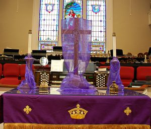 altar shrouded in purple