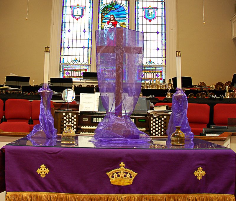 altar shrouded in purple
