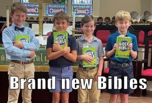 boys with new Bibles